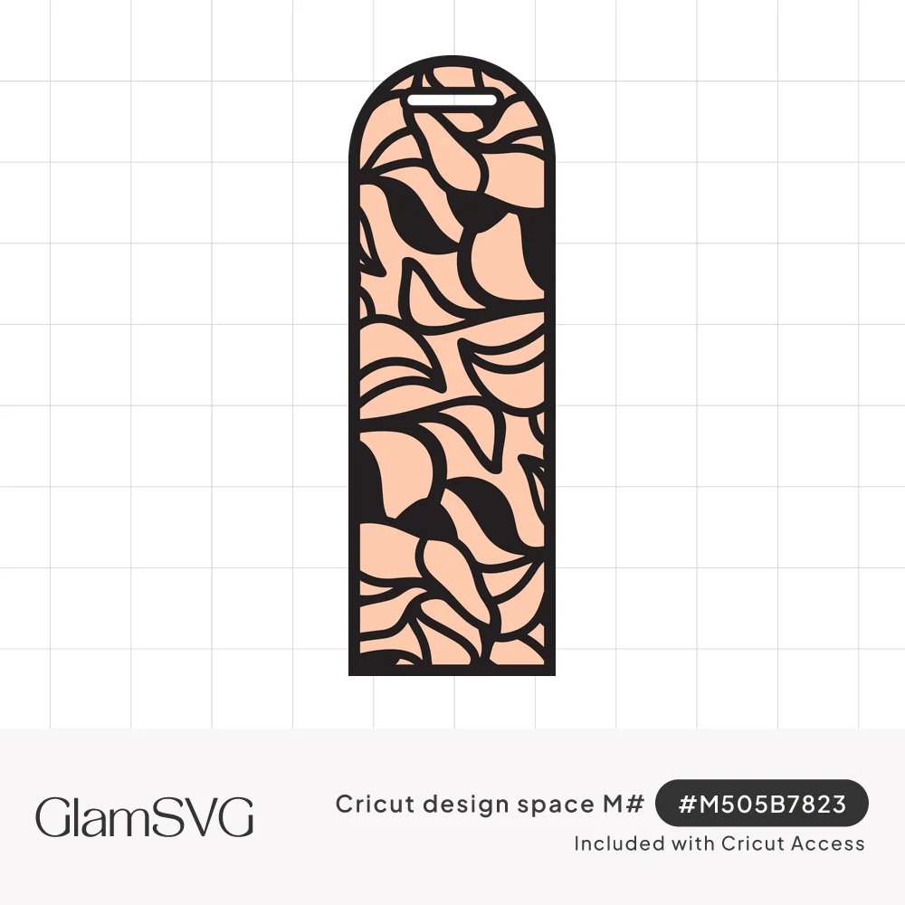 Arched bookmark with black swirling leaf cutout pattern over a peach backing and a tassel slot at the top