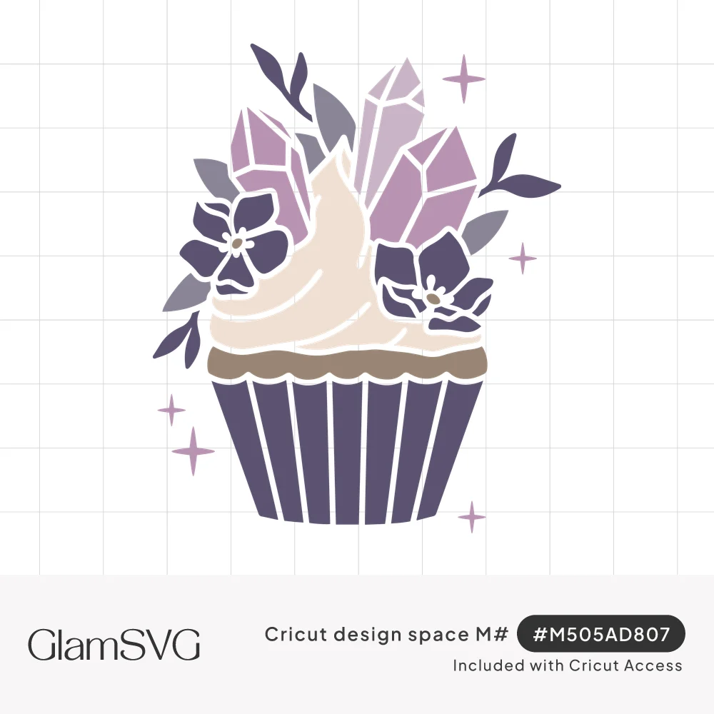 Purple cupcake with cream frosting topped with lavender crystals, violet flowers, leaves and small sparkles
