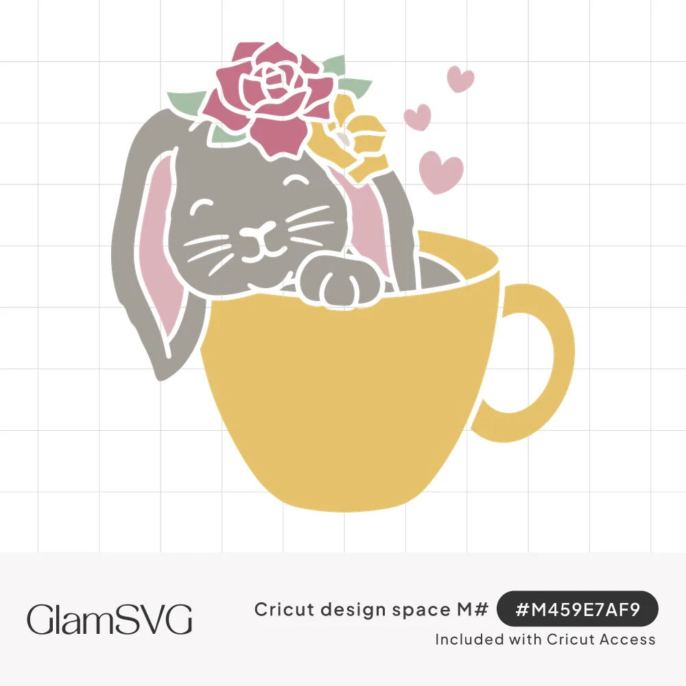 Gray lop-eared bunny with pink rose and yellow flower sitting in a yellow teacup with small pink hearts