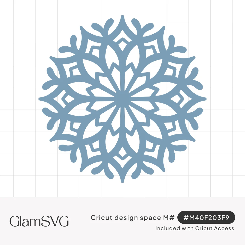 Ornate dusty blue snowflake with curled branch tips and diamond-shaped cutouts around a star center